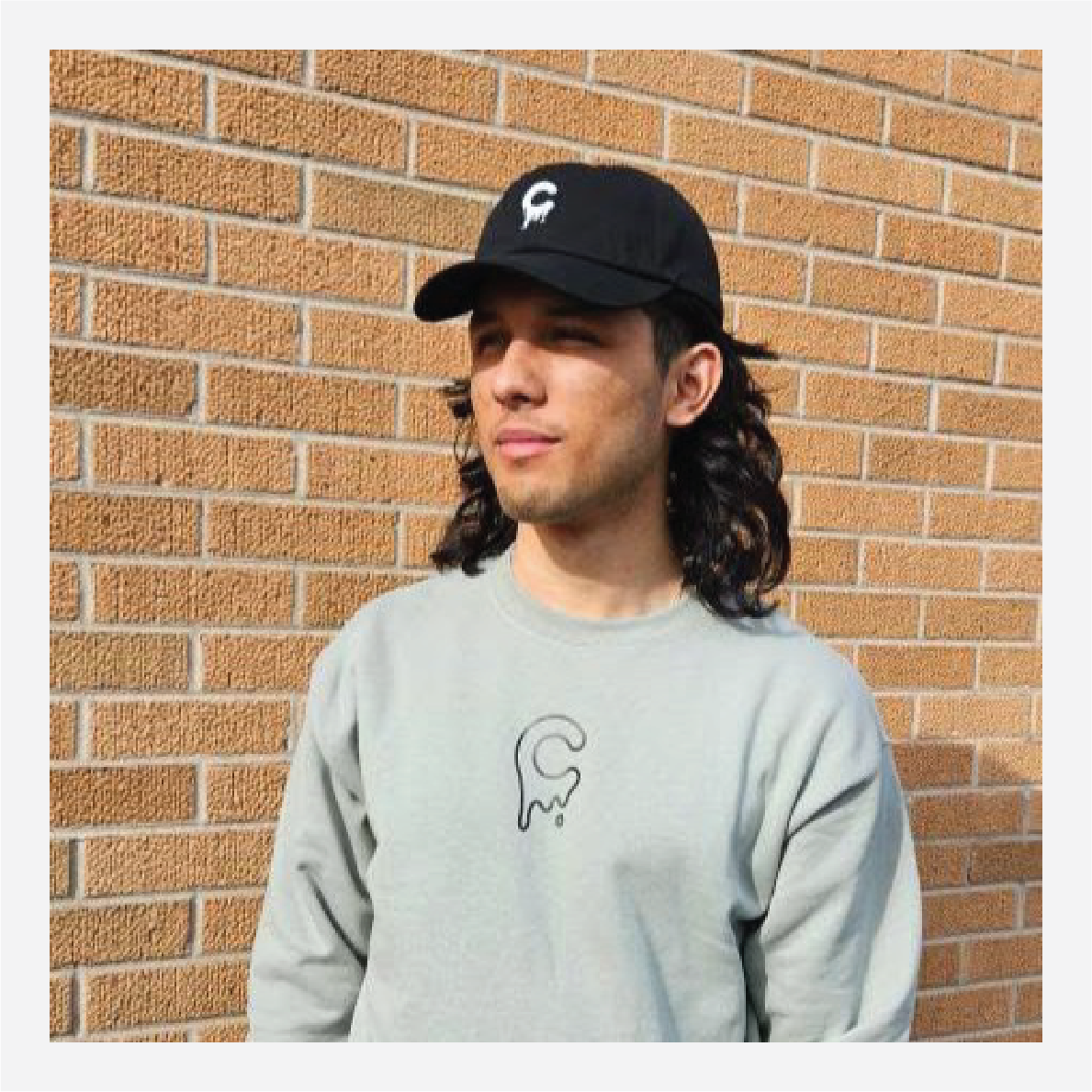 mCream Merch - Model in dynamic pose with everyone t-shirt